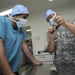 US Army veterinarians train host-nation veterinarians on small animal medicine