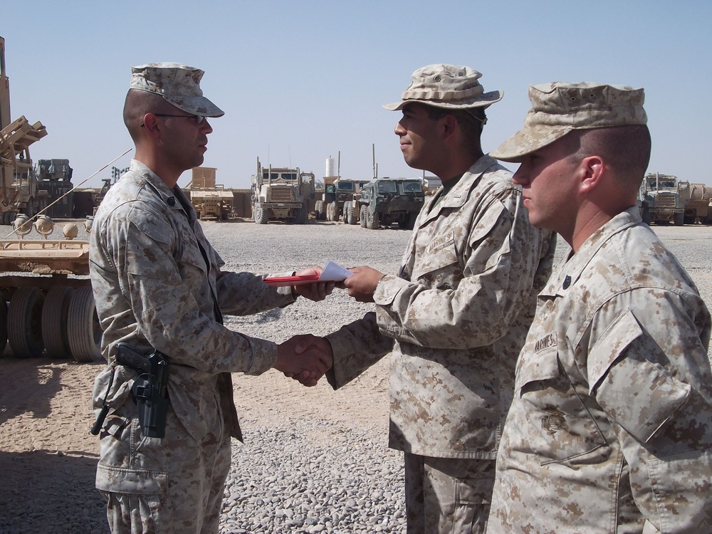 Staff Sergeant Re-enlists after successful deployment