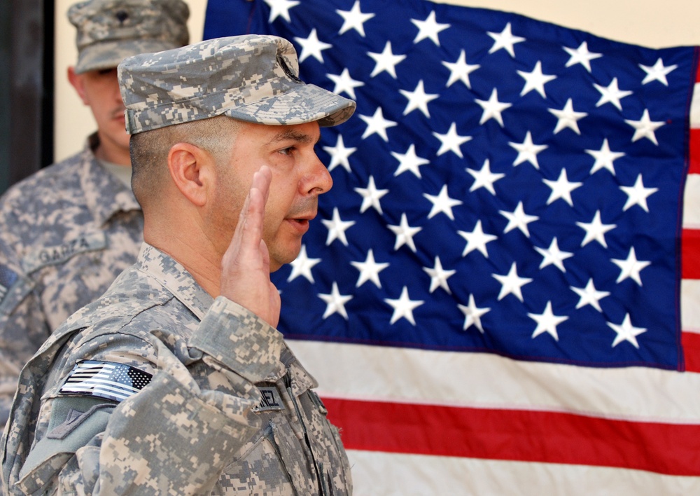 Army first sergeant re-enlists