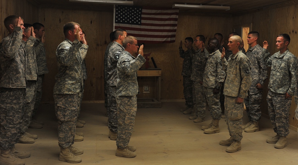 Members of the 101st Airborne Division Re-enlist While Deployed