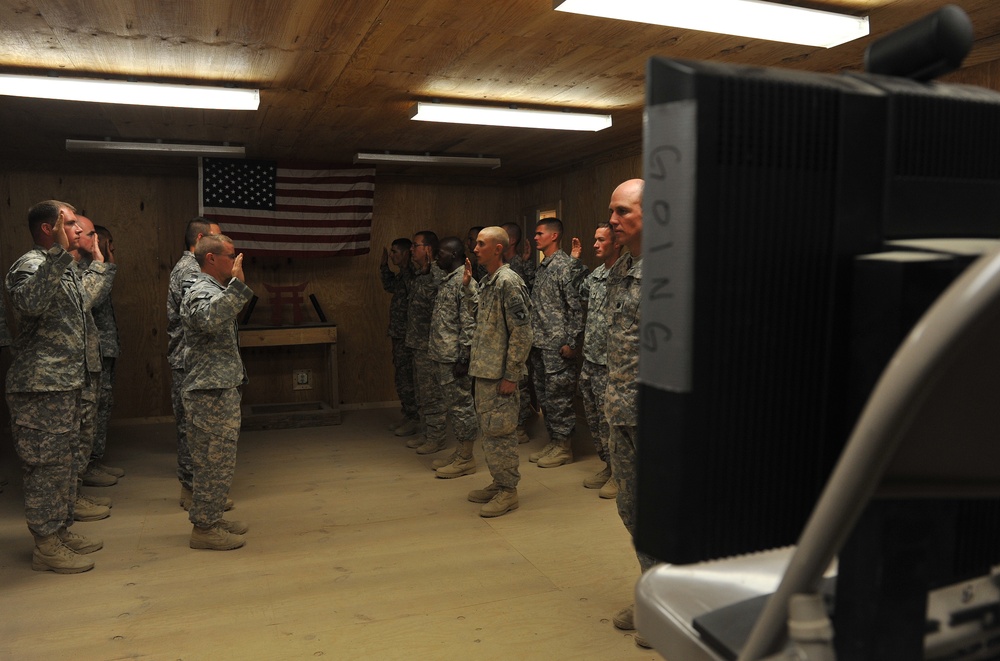 Members of the 101st Airborne Division Re-enlist While Deployed