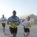 Deployed Service members, Civilians Compete in Army 10-Miler Shadow Run