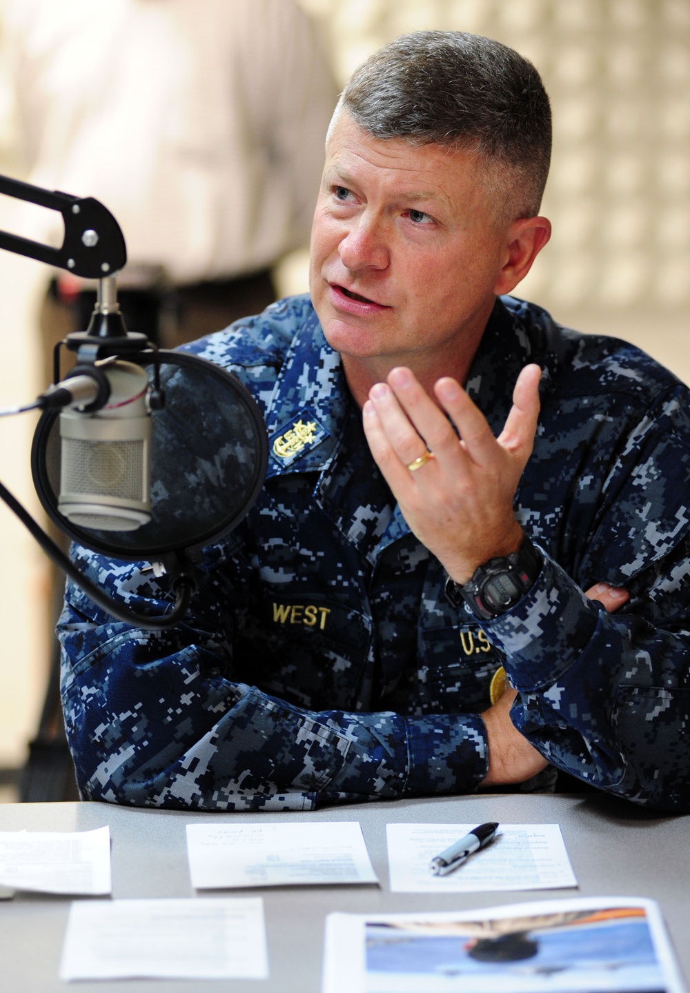 Master Chief Petty Officer of the Navy Rick West gives a radio interview