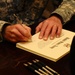 Gen. Petraeus conducts 158 re-enlistments at forward location
