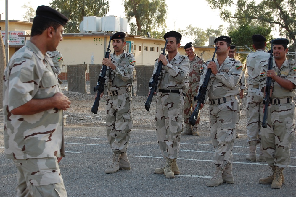 Perfecting drill and ceremony,36th Iraqi Army Brigade hosts 7-day course for guards