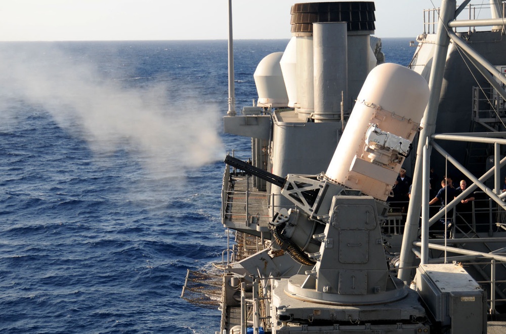 USS Gettysburg fires weapons