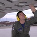 VP-9 Crew Members Conduct Preflight Checks on P-3 Aircraft