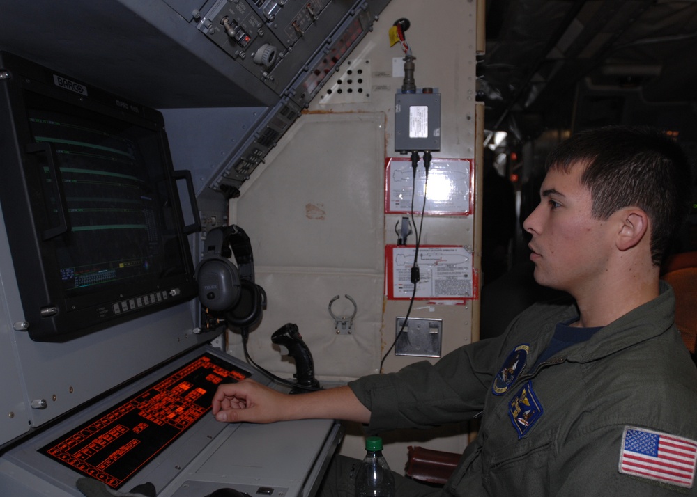 VP-9 Crew Members Conduct Preflight Checks on P-3 Aircraft