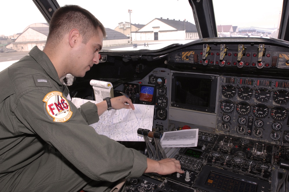 VP-9 Crew Members Conduct Preflight Checks on P-3 Aircraft