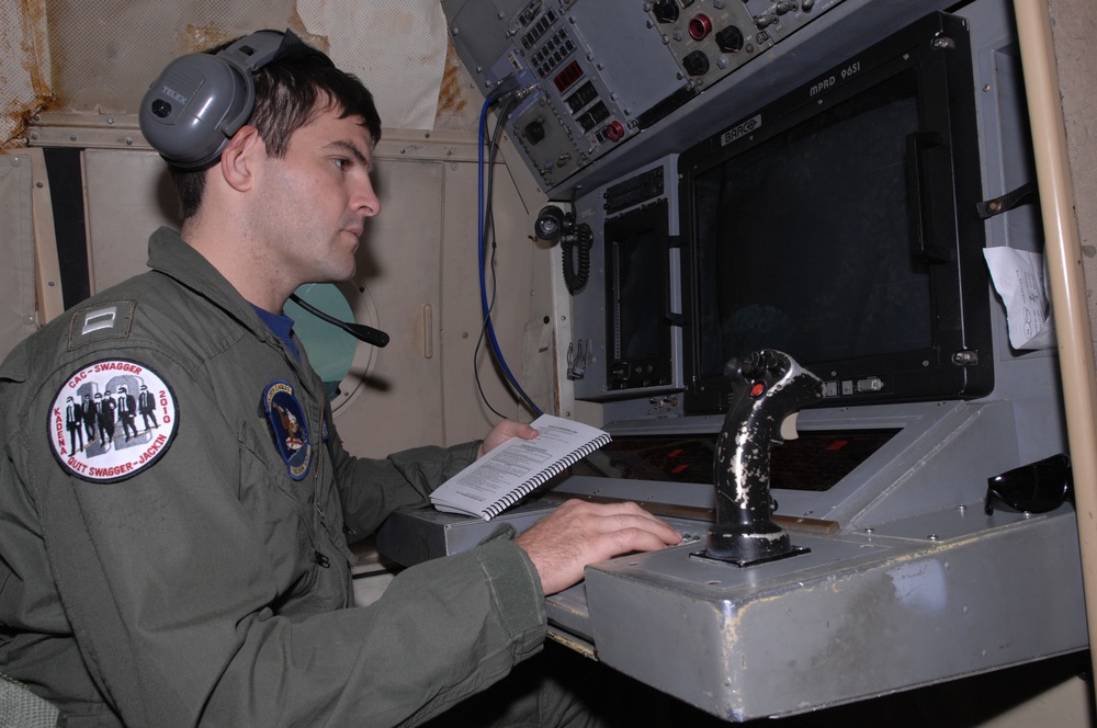VP-9 Crew Members Conduct Preflight Checks on P-3 Aircraft