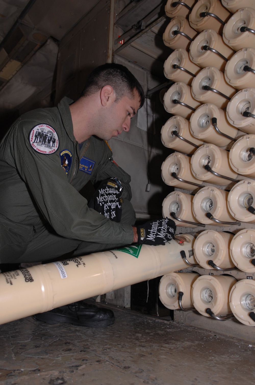 VP-9 Crew Members Conduct Preflight Checks on P-3 Aircraft