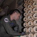 VP-9 Crew Members Conduct Preflight Checks on P-3 Aircraft