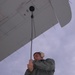 VP-9 Crew Members Conduct Preflight Checks on P-3 Aircraft