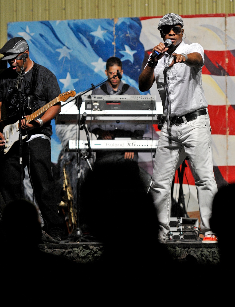 Mint Condition performs for troops