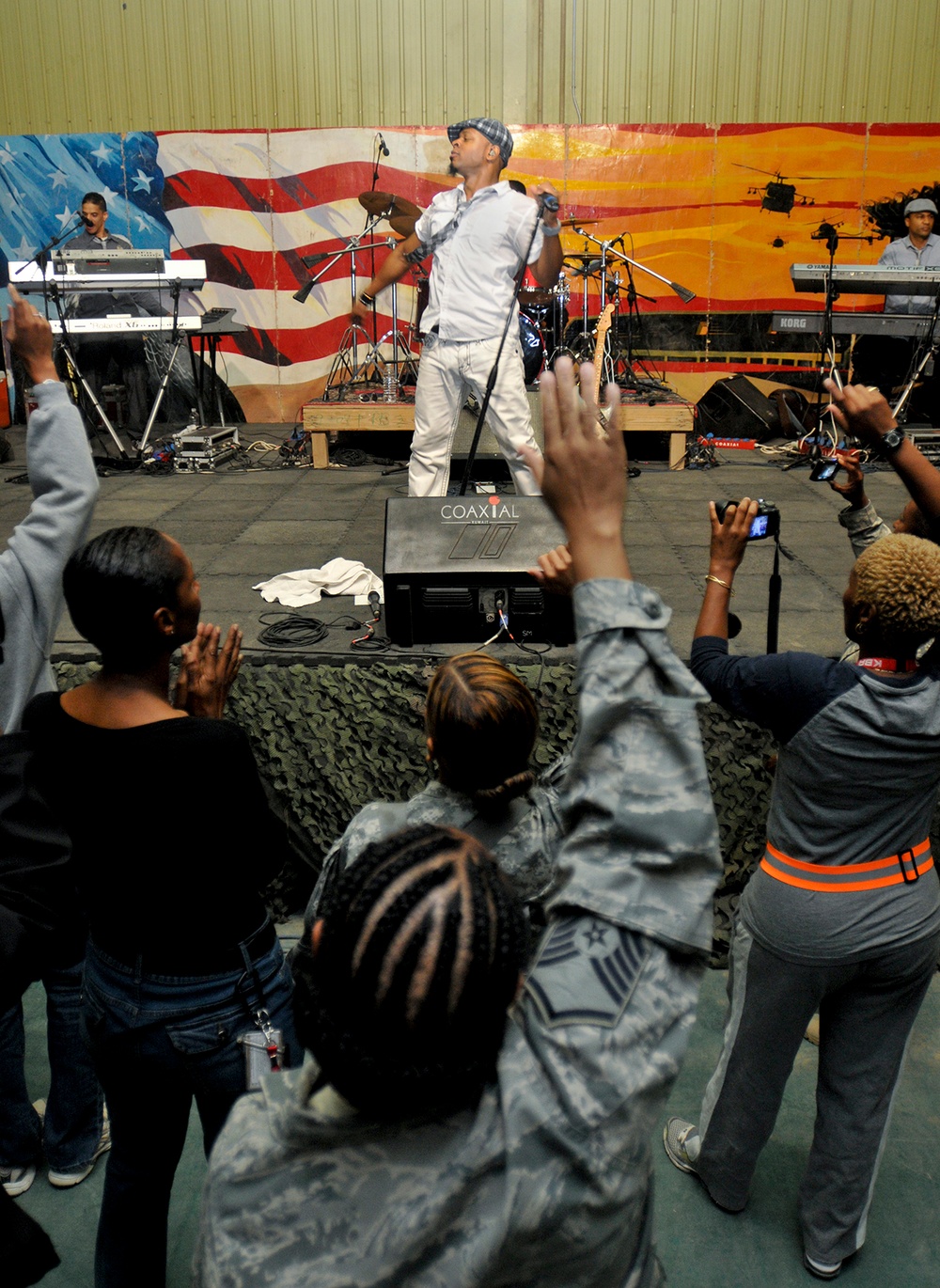 Mint Condition performs for troops
