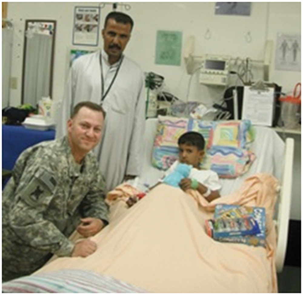 Cavalry Regiment Soldiers bring gifts to hospitalized Iraqi children