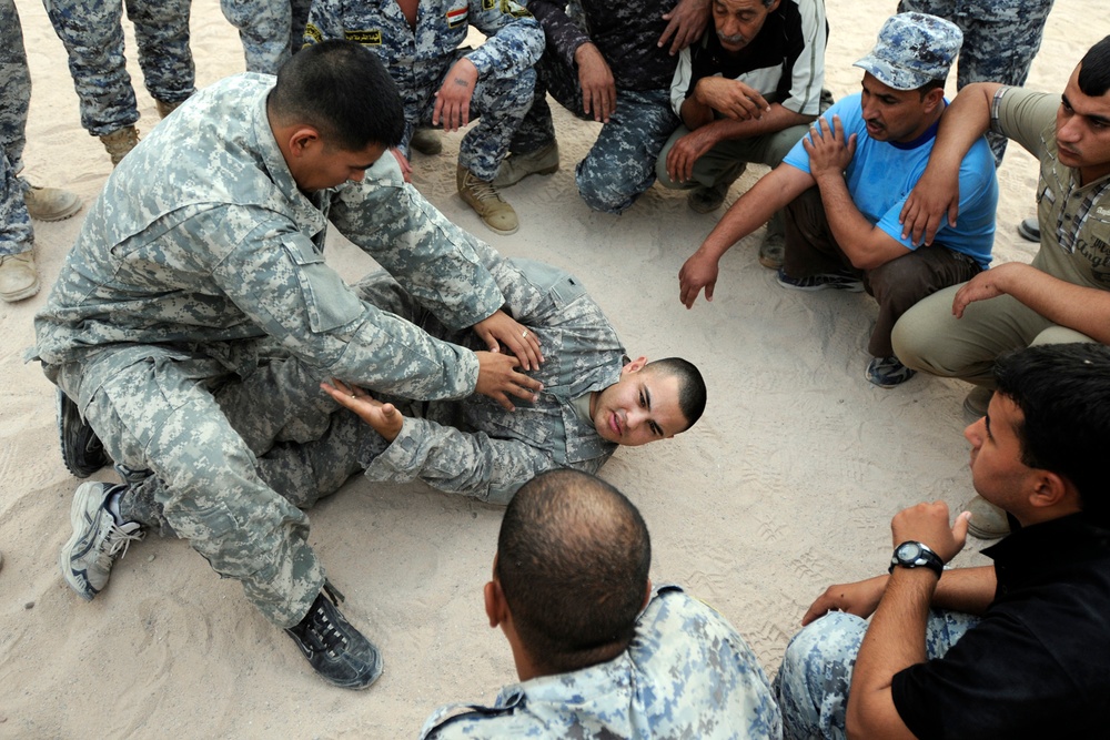 Combatives improves fitness, partnership between Iraqi National Police, USD-C Soldiers