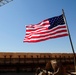 Service members fly flags over palace for 9/11 remembrance
