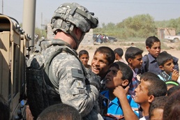 Building lasting ties: IA, USD-C Soldiers distribute medicine, school supplies to local residents at North Halabsah School
