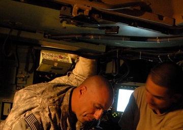 Deployed Advise and Assist Brigade trains on their big guns with gunnery in Kuwait