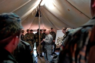 U.S., German soldiers cross train in marksmanship