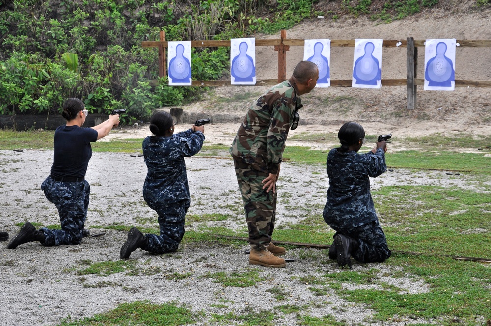 Sailors fire pistols