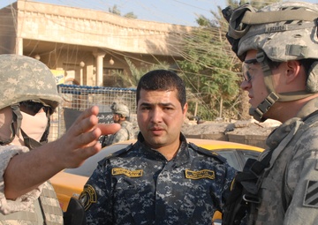 USD-C Soldiers, Iraqi National Police conduct joint counter-IED patrol