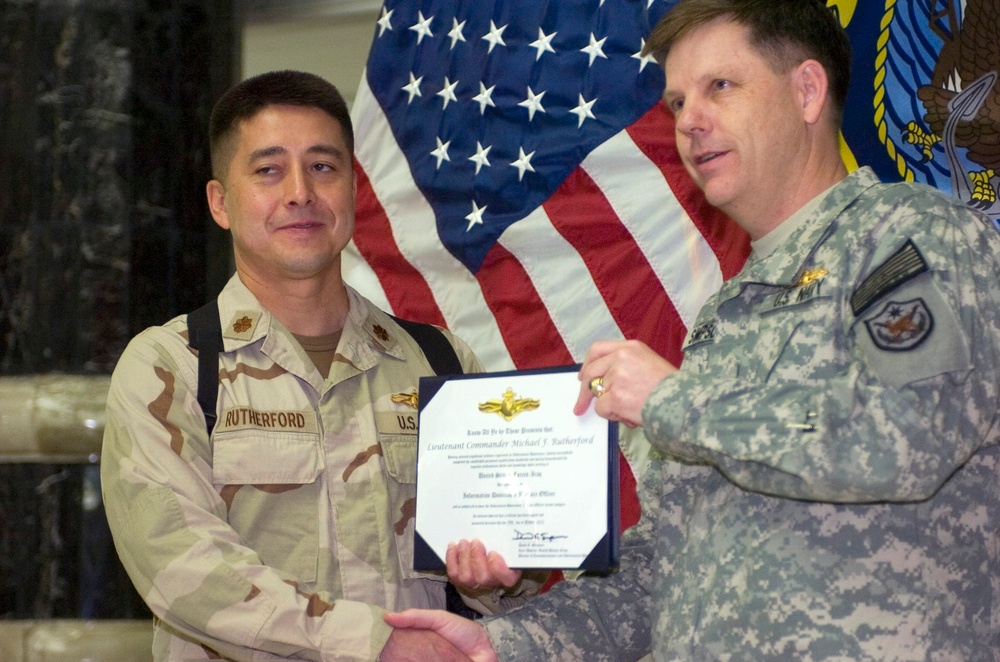 Information Dominance Corps Warfare insignia award ceremony