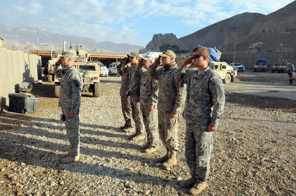 Bamyan ETT lowers flag at Romero Base