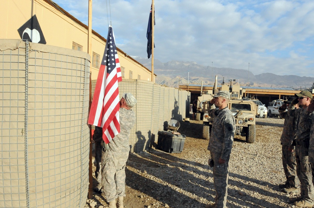 Bamyan ETT lowers flag at Romero Base