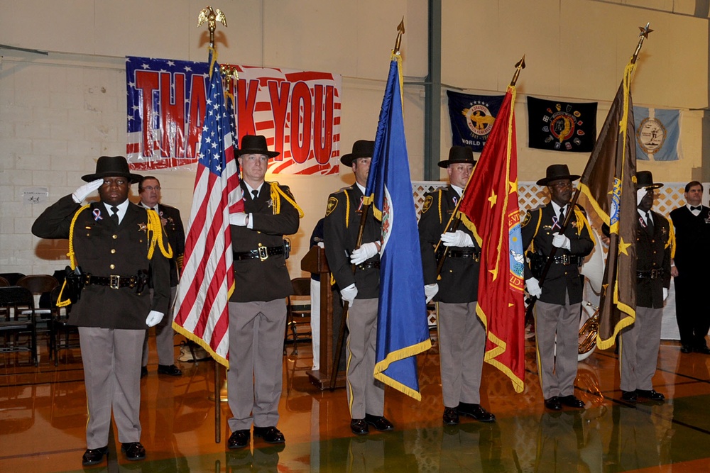 Members of the Chesapeake Sheriff's Department post the colors during the Veterans Day ceremony Nov. 4. The Niners Citizen's Club hosted the event at the South Norfolk Community Recreation Center to honor all active duty and retired military.