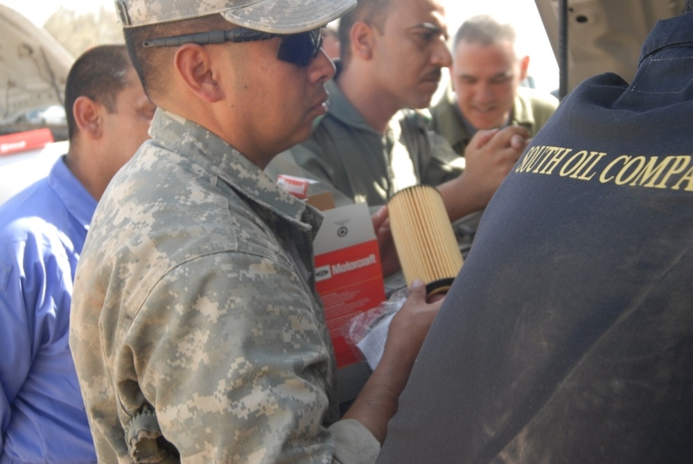 Iraqi mechanics learn techniques in vehicle upkeep