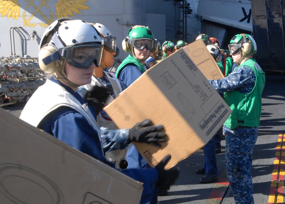 USS Ronald Reagan helps cruise ship