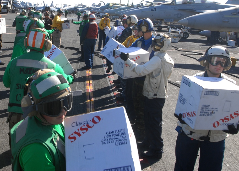 USS Ronald Reagan helps cruise ship