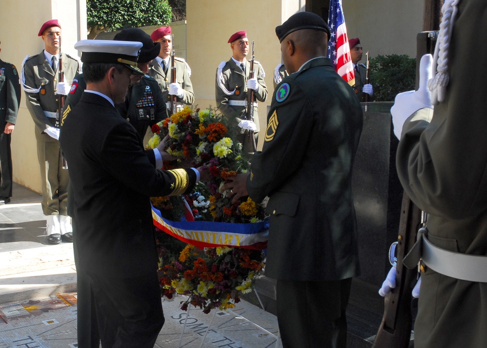 Vice Adm. Harry B. Harris Jr., commander of the U.S. 6th Fleet, lays a wreath in support of United States Africa Command during a Veterans Day wreath-laying ceremony honoring American veterans at the North Africa American Cemetery. The North Africa Americ