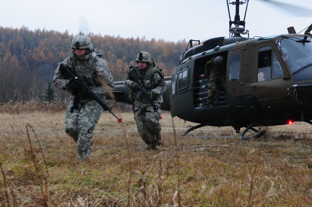 Missouri Army National Guard and Japanese military unite to overtake enemy forces