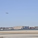 Replica Curtis bi-plane conducts a flyover celebrating 100 years of Naval Aviation