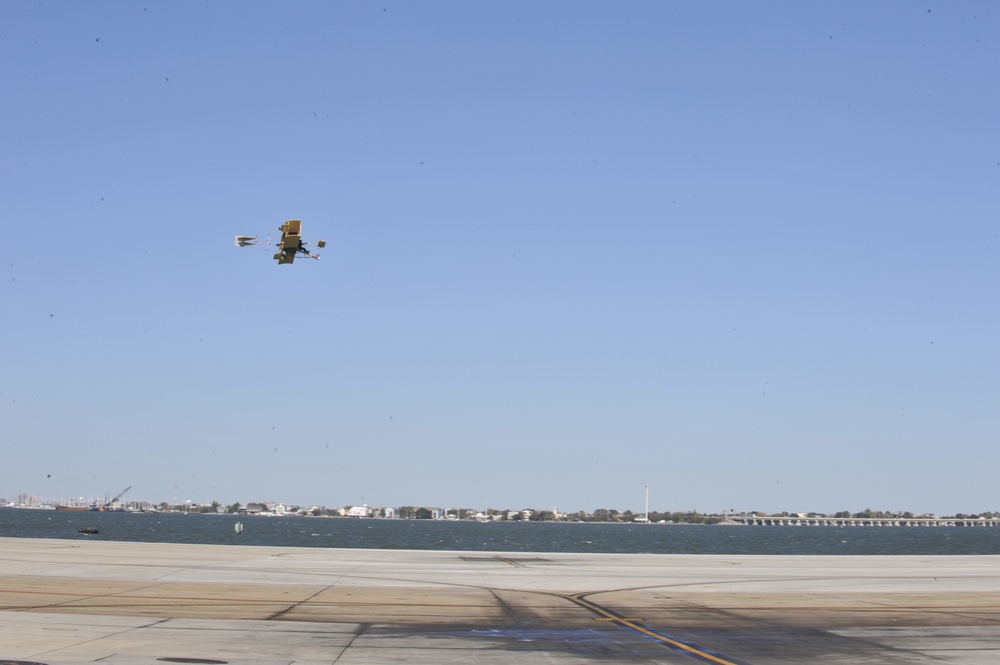 Replica Curtis bi-plane conducts a flyover celebrating 100 years of Naval Aviation