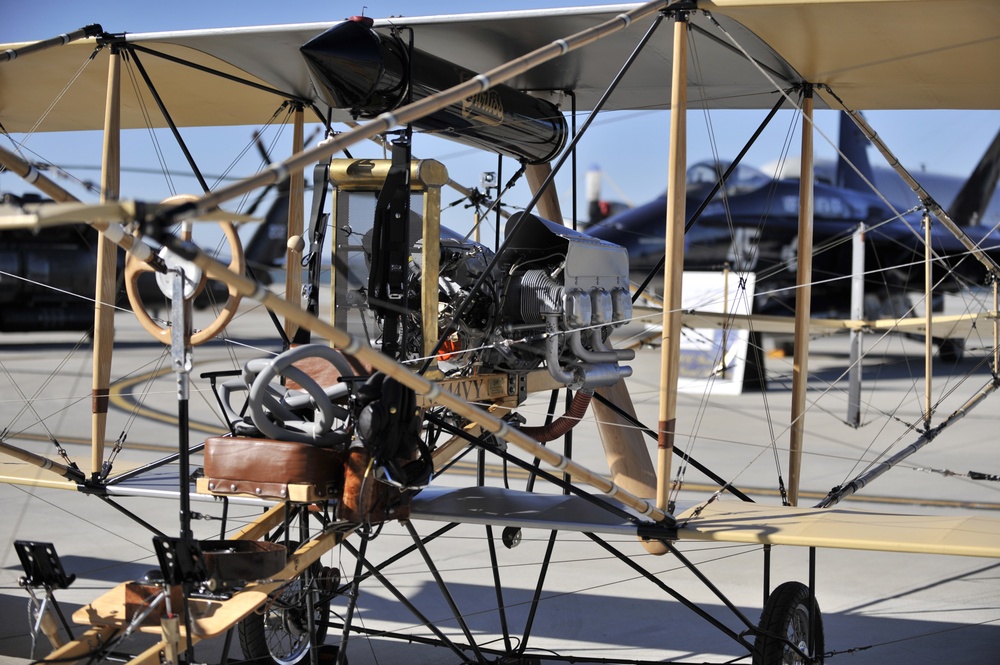 Replica Curtis bi-plane conducts a flyover celebrating 100 years of Naval Aviation