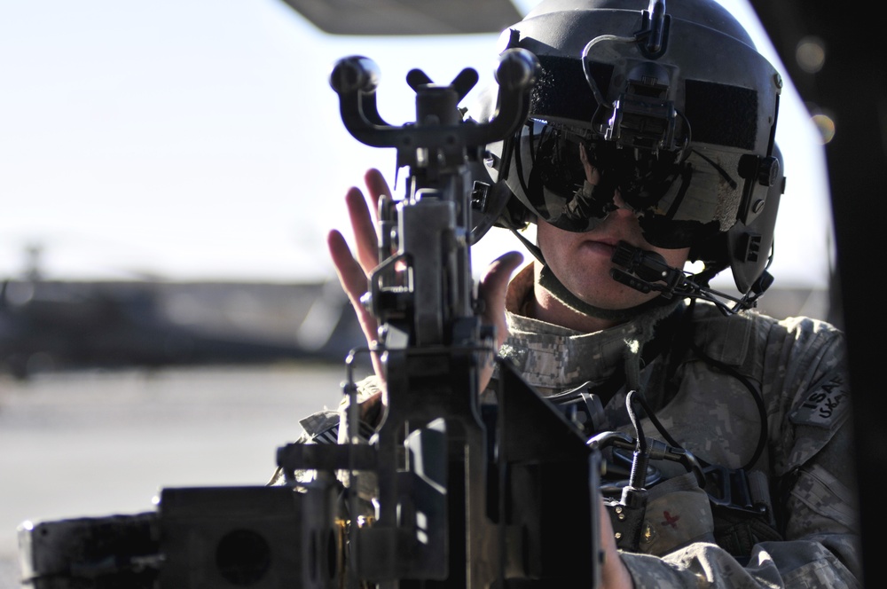 Task Force Eagle Assault's UH-60 Black Hawk Pilots and Crew Chief Transport Troops And Supplies