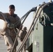 Helicopter Support Team Marines prepare cargo