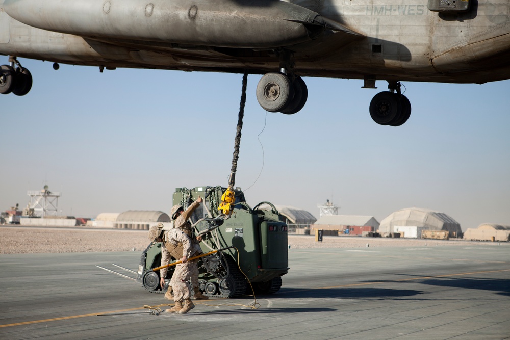 Helicopter Support Team Marines prepare cargo