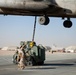 Helicopter Support Team Marines prepare cargo