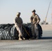 Helicopter Support Team Marines prepare cargo