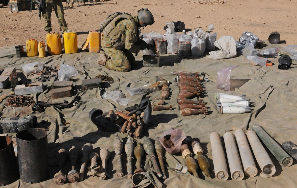 ANA, Australian soldiers patrol, find weapons caches