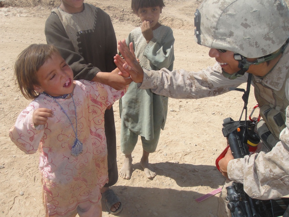 *REQUEST REMOVAL BY UNIT* Marine uses personal experiences to help Afghans