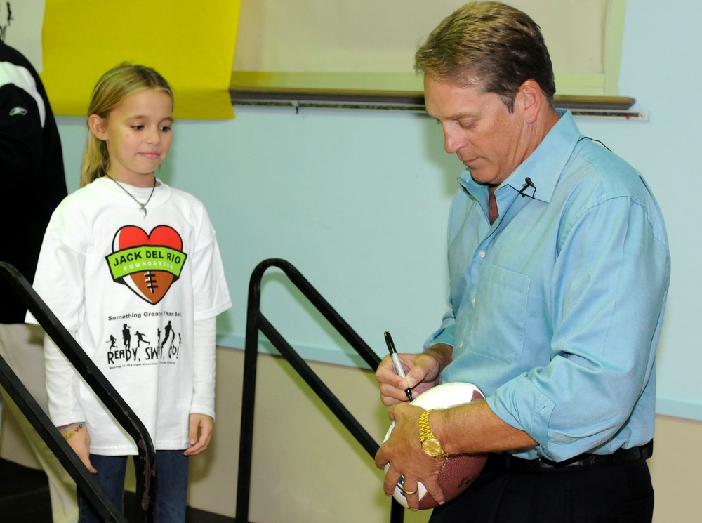 Jaguars Coach Signs Autographs For Military Children