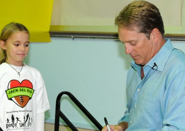 Jaguars Coach Signs Autographs For Military Children