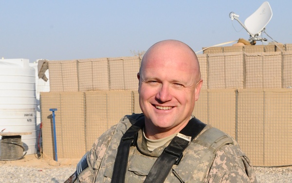 National Guardsmen distribute school supplies