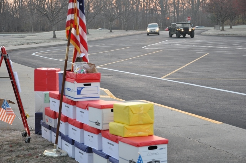 Tots share treats with troops, Afghan kids